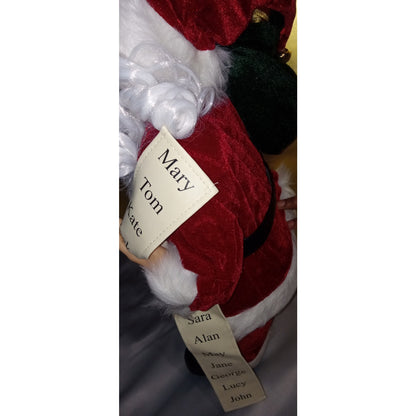 Northlight 24" Santa Claus with Bag of Gifts and Naughty or Nice List Figure